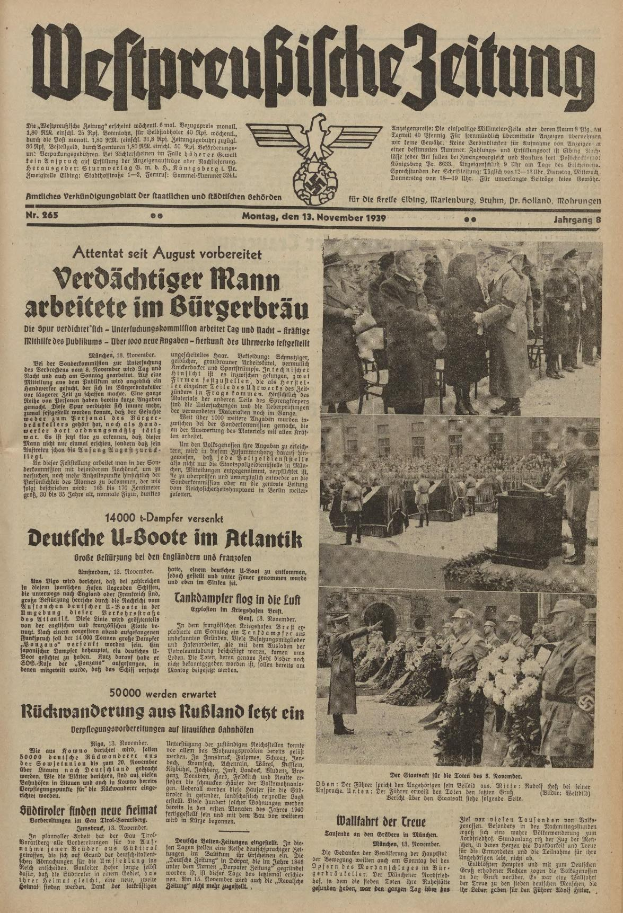 Schwarze und wei├če Titelseite einer deutschen Zeitung vom 13. November 1939, betitelt 'Weitpreubliche Zeitung', mit einer Gruppe von Menschen in traditioneller deutscher Tracht in einer feierlichen Szenerie.