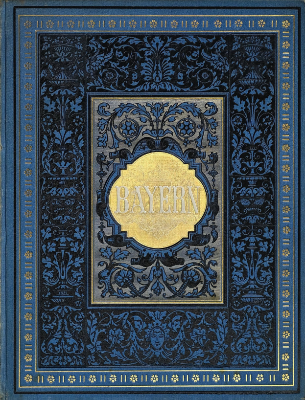 Ein blau-goldenes Buch mit dem Wort "Bayern" auf dem Cover, das kunstvoll verzierte Designs aufweist.
